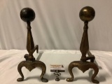 Pair of vintage metal fireplace andirons, approx 20 x 8 x 17 in. each.