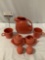 8 pc. set of red Homer Laughlin Co. Fiesta ceramic tableware; pitcher, creamer, sugar, mugs,