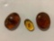 Collection of three Burmese (Burmite) Amber nuggets, each containing one more fossil insects.