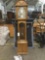 Very nice better quality Howard Miller grandmother clock complete w/ pendulum and weights