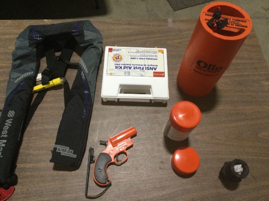 Boating emergency items, Orion flare gun, pump out adapter, first aid kit,Flotation device W/light