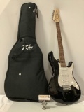 Fernandes Guitars electric guitar w/ Peavey gig bag, approx 12 x 40 in.