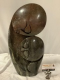 Large African stonecarving from Zimbabwe signed by artist, approx 10 x 20 x 4 in. Shows finish wear.