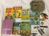 Vintage canvas bag w/ collection of BSA Boy Scouts of America books, knives, Cub Scout uniform