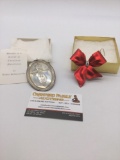 1972 towel Sterling silver Christmas medallion and a red metal bow w/ Swarovski crystals