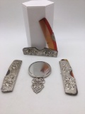 Collection of 3 vintage silver colored Denmark comb holders and a small figural compact mirror