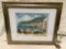 Framed art print of boats on shore w/ coastal city in background, approx 23 x 19 in.