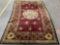 FEIZY Rugs wool rug with floral pattern, shows wear, needs cleaning, approx 61 x 96 in.