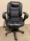 Rolling office chair w/ worn seat, approx 24 x 26 x 37 in.