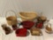 11 pc. lot of vintage woven baskets w/ decorative trim, approx 24 x 18 x 11 in.