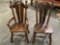 Pair of vintage wood dining chairs, approximately 23 x 18 x 43 in.
