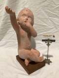 1962 Austin Productions ceramic sculpture of child on wood base, approx 8 x 6 x 16 in.