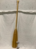 Feather Brand wooden canoe paddle, approximately 7 x 66 in.