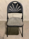 Sudden Comfort folding chair with upholstered seat and plastic back. INV 2212