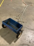 Vintage RED DEVIL lawn fertilizer spreader, tested and working, approx 43 x 25 x 25 in.