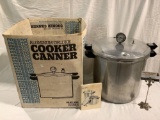 Vintage PRESTO aluminum deluxe cooker canner, 22 quart size with original box and booklet.