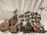 Lot of vintage / antique heavy metal hooks, pulleys, and more.