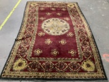 FEIZY Rugs wool rug with floral pattern, shows wear, needs cleaning, approx 61 x 96 in.