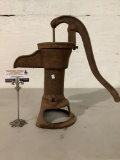 Rusty antique metal water pump, approx 18 x 18 x 8 in.