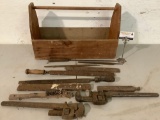 Antique wood tool rack w/ antique tools, files, pipe wrenches, some with wood handles.