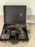 Black & Decker cyclone series cordless super cyclone drill with metal case, batteries, charger.