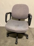 Rolling office chair, upholstery is worn, approx 24 x 26 x 34 in.