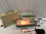 Vintage SINGER sewing machine, tested/working, approx 19 x 16 x 8 in.