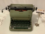 Vintage R.C. Allen typewriter w/ green metal body & keys, tested/working w/ plastic cover