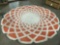 vintage orange and cream colored wool rug with geometric design, needs cleaning