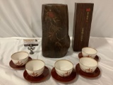 11 pc. lot Asian table setting; wooden centerpiece vase w/ bird design, 5 porcelain cups w/ gift