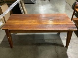 Vintage natural wood top coffee table with solid construction, approx 25 x 47 x 19 in.