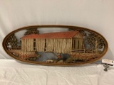 Burwood Products Co. vintage man w/ dog fishing under covered bridge art piece, approx 36 x 14 x 1.5