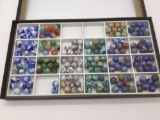 14.5 x 8 display box almost filled with machine mades marbles see pics