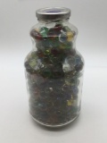 Huge selection of vintage / antique clear colored marbles in a half gallon container