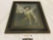 Framed vintage art print of boy with rabbit, approx 17 x 21 in.