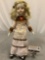 Vintage/ antique painted porcelain 18 inch doll w/ outfit and metal stand