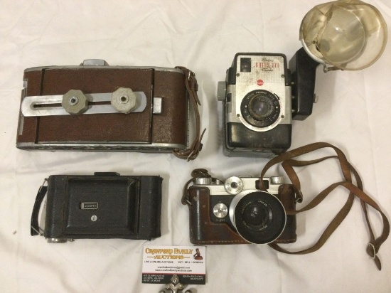 4 pc. Lot of antique cameras; ARGUS c44, Kodak DAK SHUTTER, Brownie Bulls Eye, Polaroid Land Camera