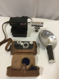 3 pc. Lot of vintage film camera equipment; ARGUS COATED CINTAR 50mm, POLAROID 640