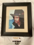Framed color portrait photo of rock star Jimi Hendrix