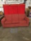 Like new elegant rust colored living room sofa/hide a bed