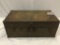 Antique metal trunk with leather handles, shows wear, approx 30 x 16 x 12 in.