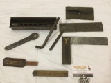 Lot of antique hand tools; socket wrench set in metal case, Stanley wood handle angle, & more