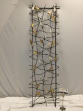 Vintage metal wire wall art piece w/ mother of pearl leaves, approx 14 x 46 in.