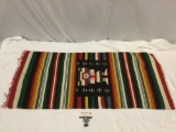 Vintage wool blanket with figure design, approx 49 x 20 in.