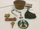 6 pc. Lot beaded Native American necklace, pin, child?s hat, canoe from Saginaw, Michigan, and more.