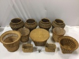 11 pc. lot of woven baskets; largest approx. 15 x 9 in. Waste baskets, planters, vintage leather