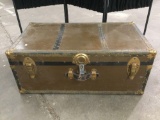 Antique travel trunk w/ leather handles, approx 31 x 17 x 12 in.