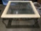 Vintage cast-iron painted frame/ glass top coffee table, approx 37 x 37 x 18 in.