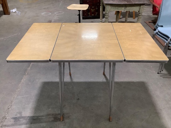 mid century drop-leaf wood laminate/ chrome kitchen table, approx 47 x 30 x 29 in.
