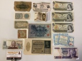 Assortment of foreign antique bills and modern paper money